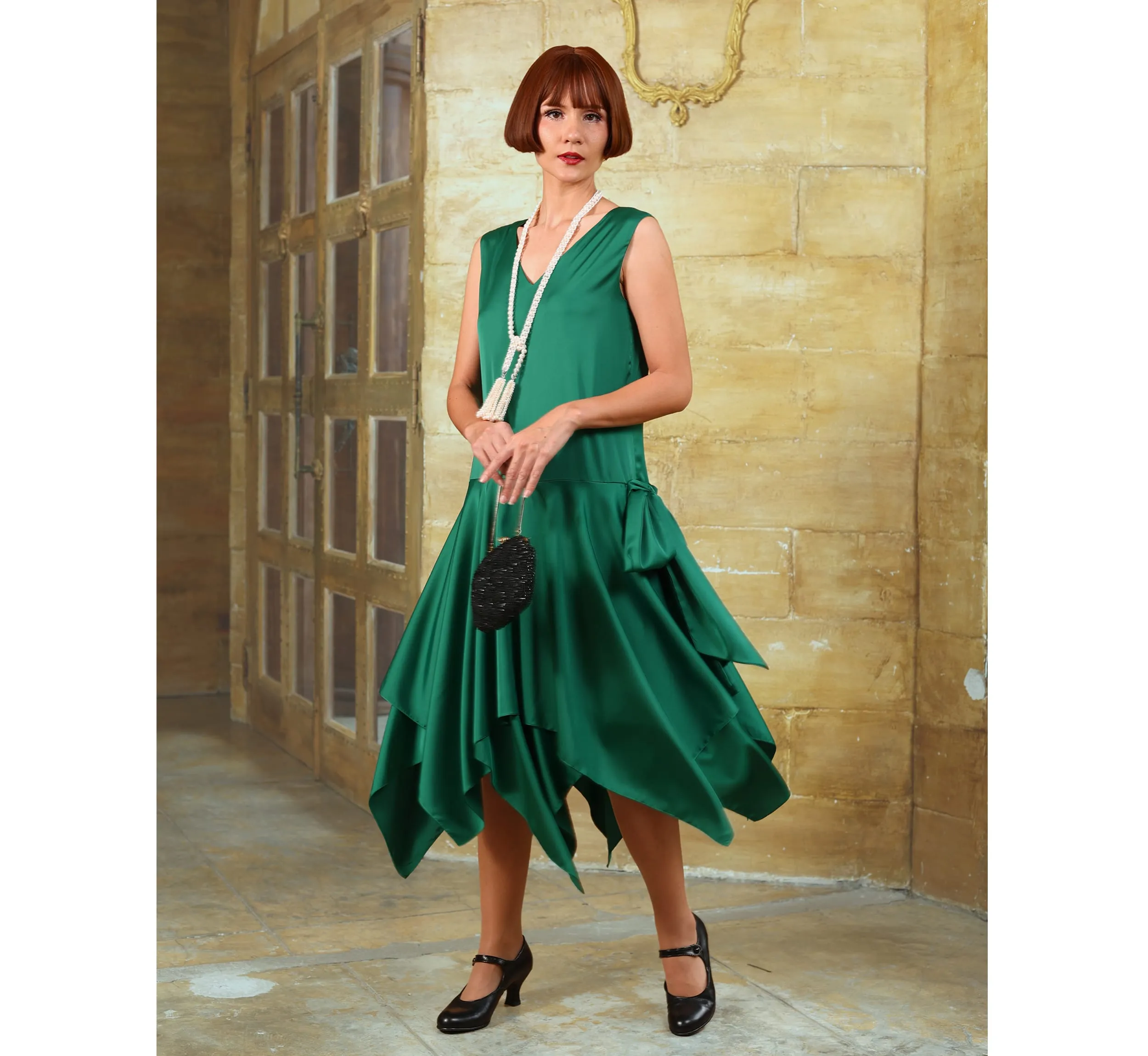 Green roaring 20s satin party dress with handkerchief skirt