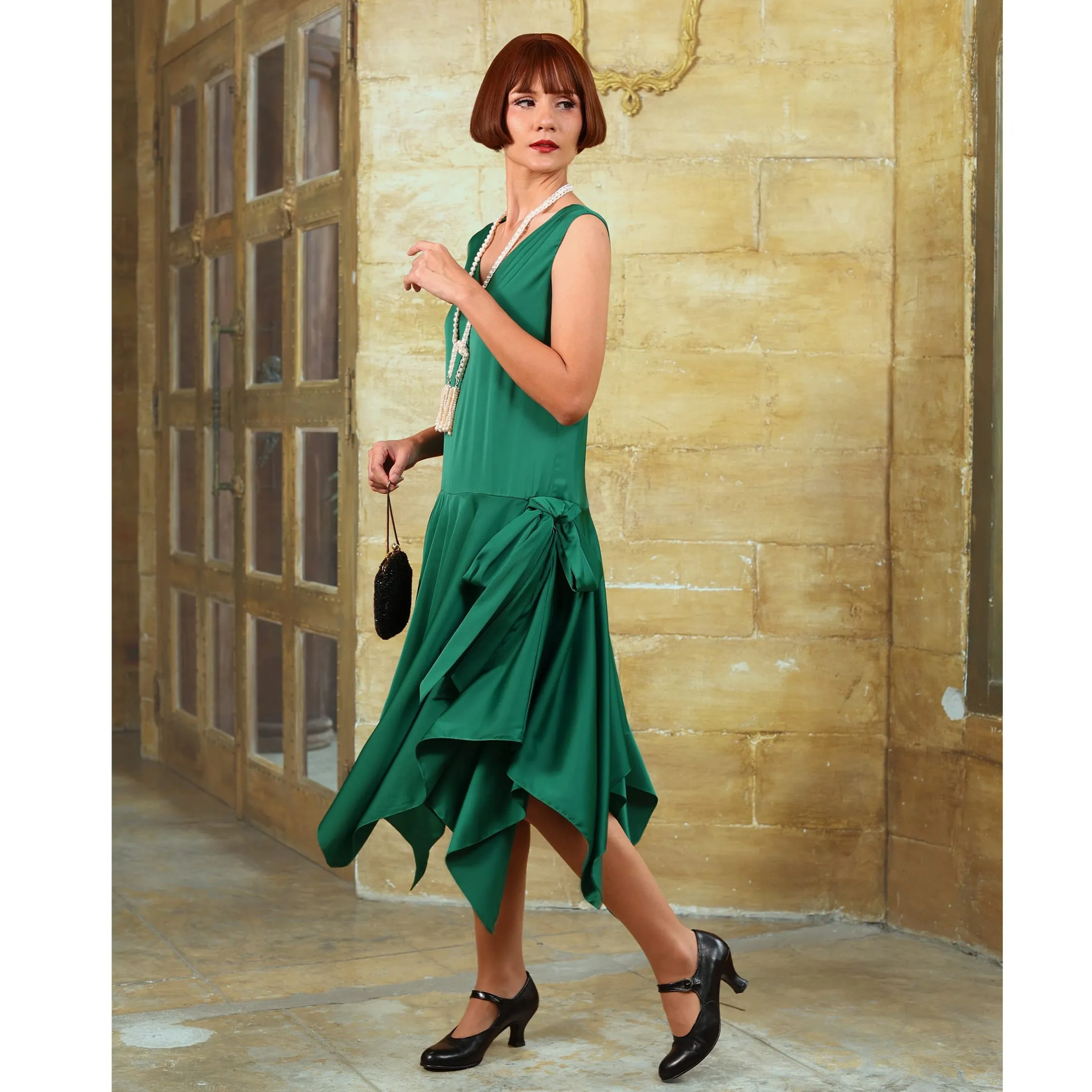 Green roaring 20s satin party dress with handkerchief skirt