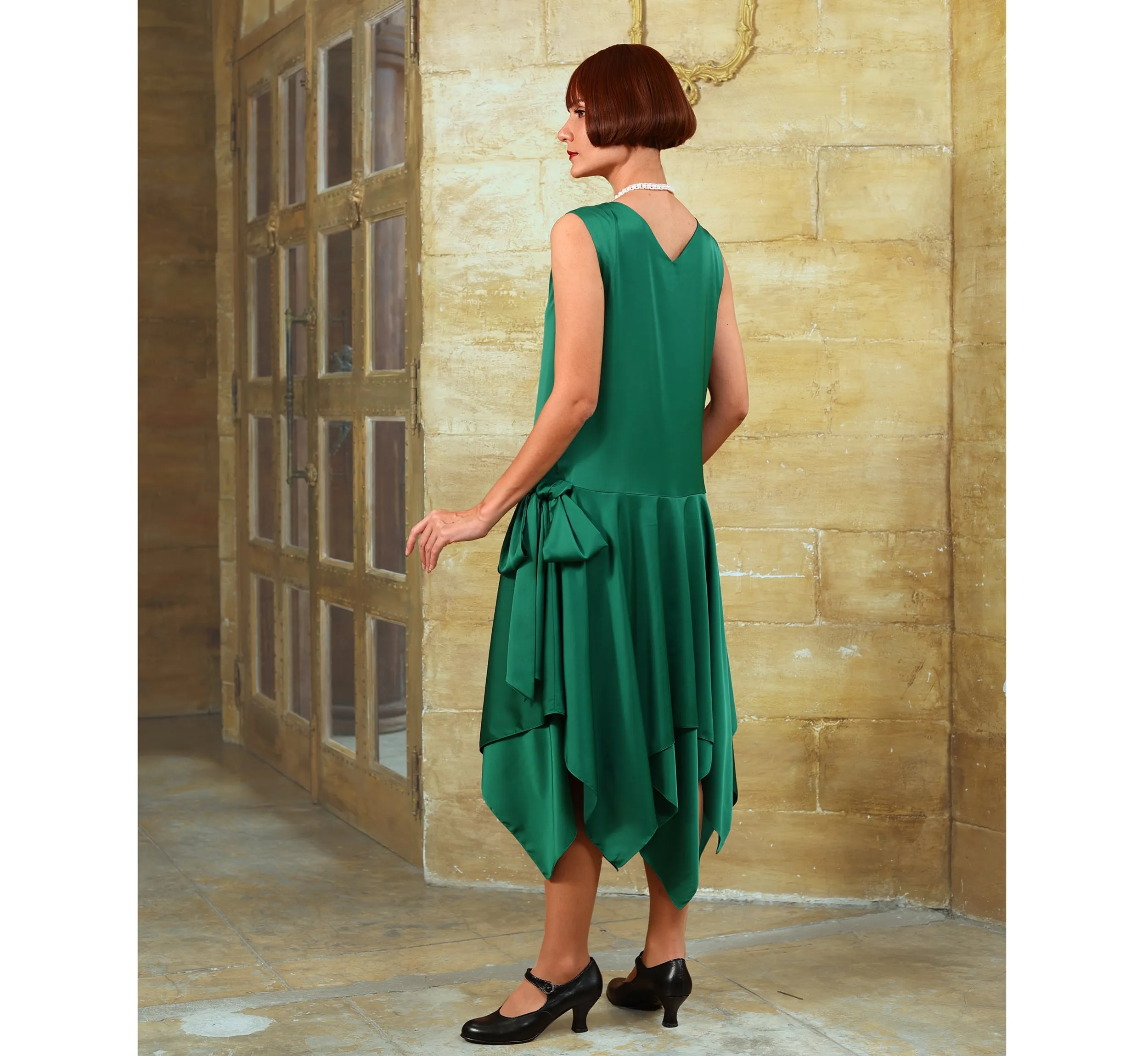 Green roaring 20s satin party dress with handkerchief skirt