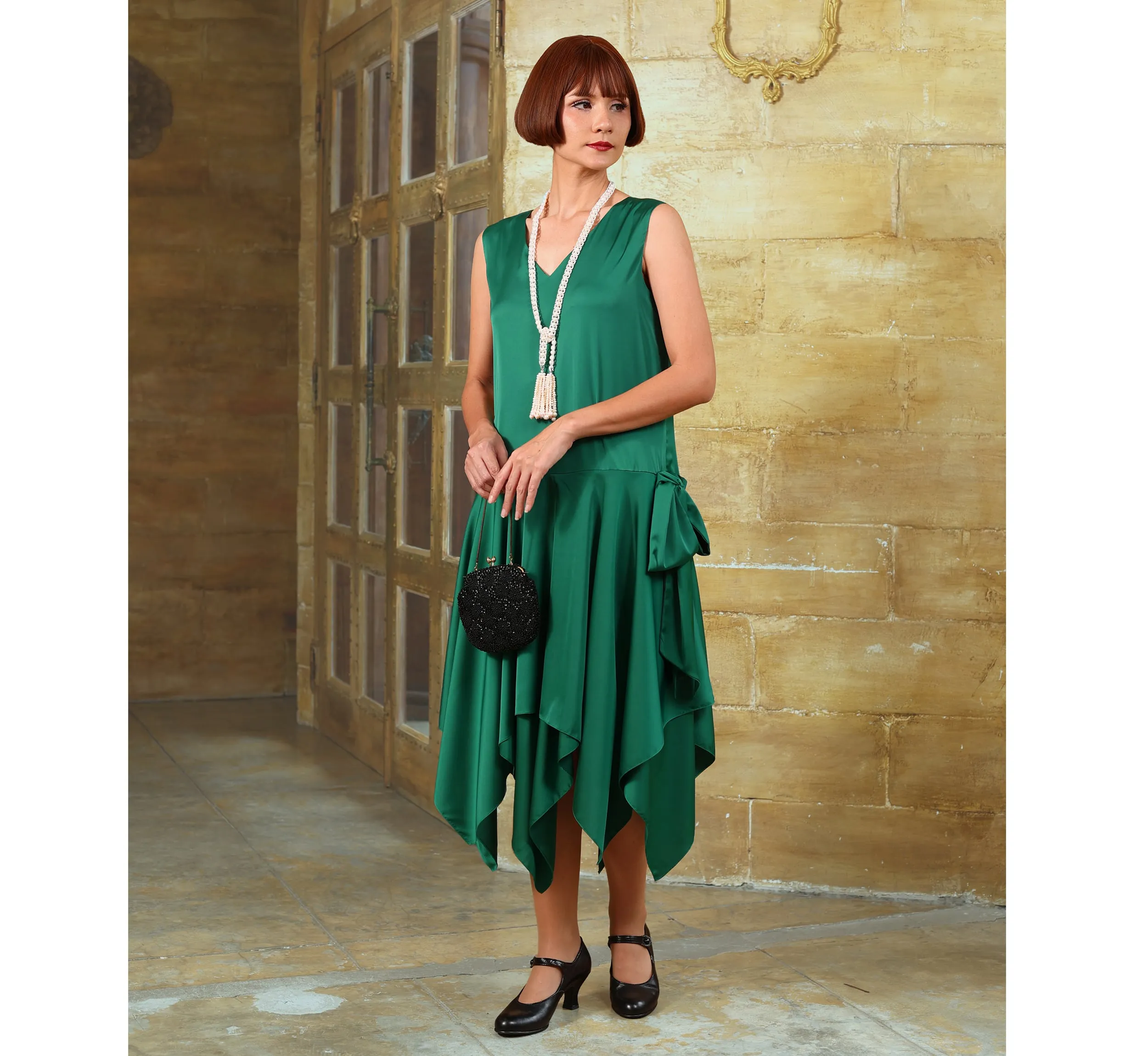 Green roaring 20s satin party dress with handkerchief skirt