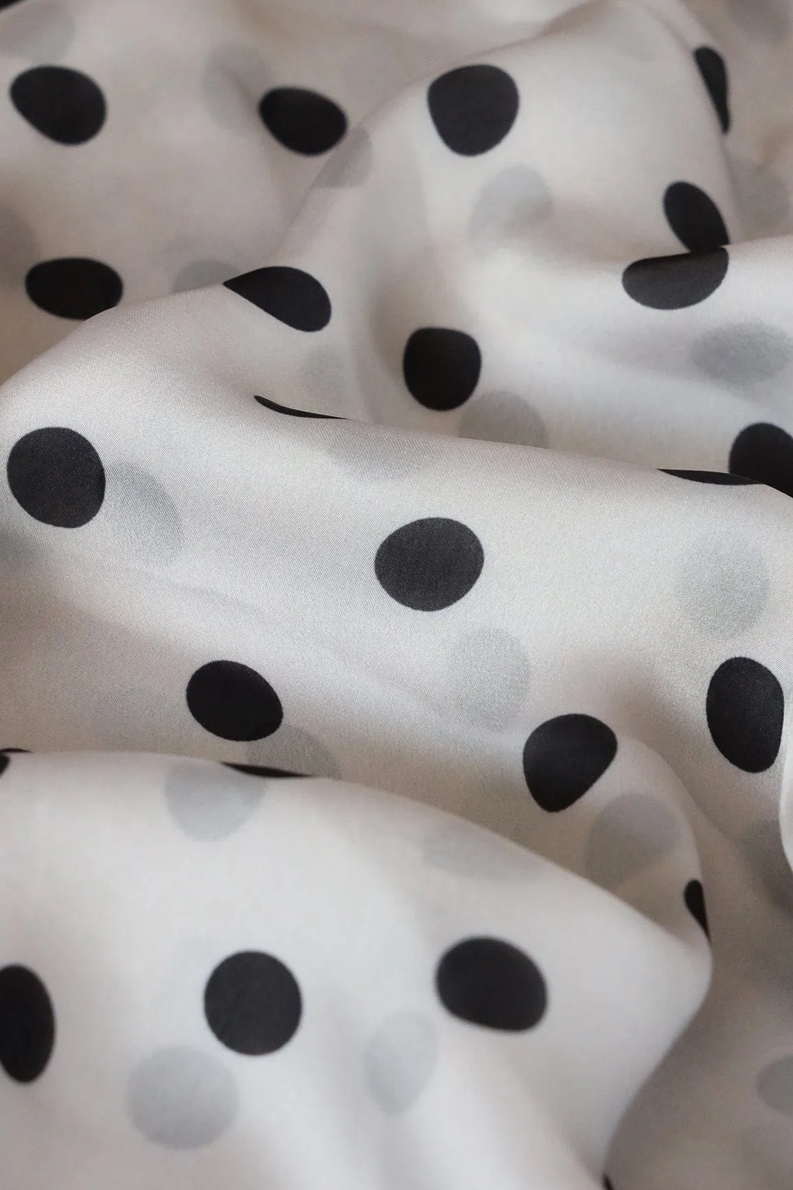 Pastel Grey And Black Polka Dots Pattern Digital Print On Georgette Satin Fabric